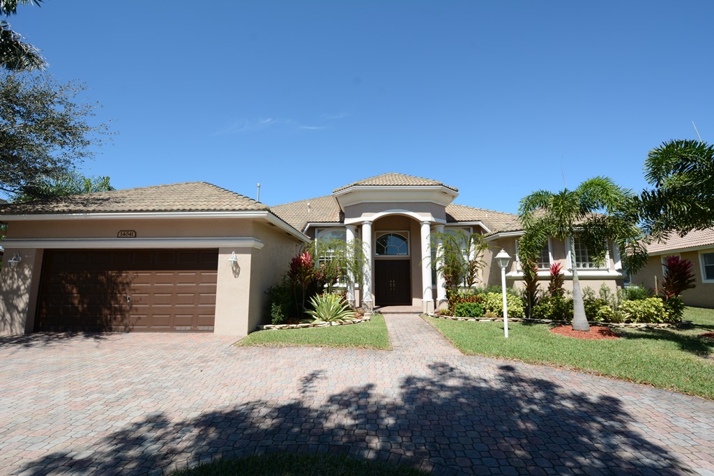 Just Listed Pembroke Falls Lakefront Monterey Model Home 14041 NW